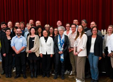 Happy reunion in Bern: workshop participants gather for a group photo